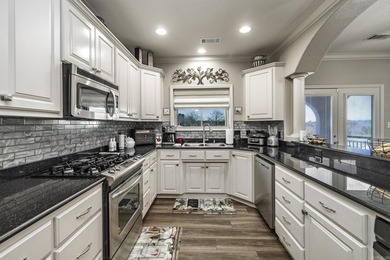 Welcome to Millennium Bay gated community. This home has been - photo 2