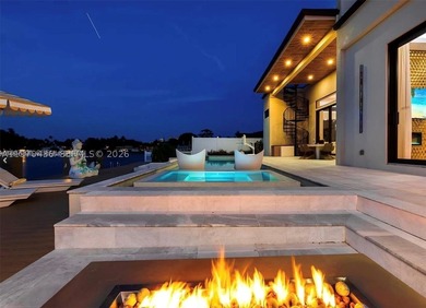 Stunning 4BR/4.5BA waterfront home in gated Bal Harbour. Nearly - photo 53