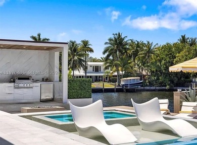Stunning 4BR/4.5BA waterfront home in gated Bal Harbour. Nearly - photo 56