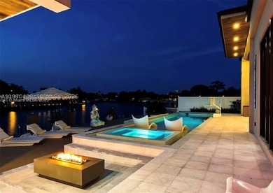 Stunning 4BR/4.5BA waterfront home in gated Bal Harbour. Nearly - photo 57