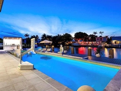 Stunning 4BR/4.5BA waterfront home in gated Bal Harbour. Nearly - photo 59