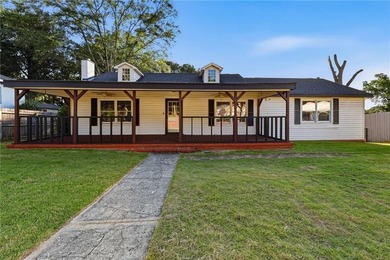 Dive in to your own private backyard oasis. Nestled in the - photo 1