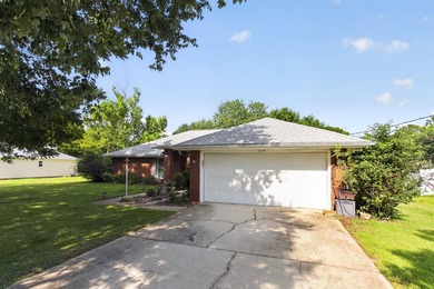 4-bedroom, 2-bath brick home offers comfort, space, and - photo 6