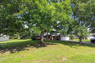 4-bedroom, 2-bath brick home offers comfort, space, and - photo 8