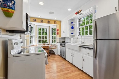 Nestled on a picturesque, wooded lot, this charming Cape Cod is - photo 13
