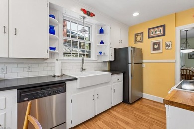Nestled on a picturesque, wooded lot, this charming Cape Cod is - photo 15