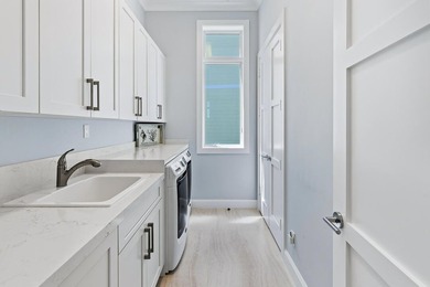 Welcome to Watersong's premier residence, set on the community's - photo 16