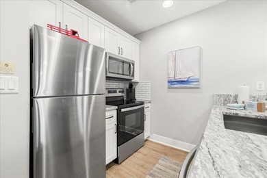 Escape to the perfect beach haven with this beautifully upgraded - photo 17