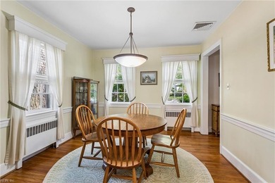Nestled on a picturesque, wooded lot, this charming Cape Cod is - photo 19