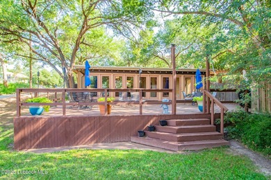 Peaceful lake living meets timeless character in this inviting - photo 2