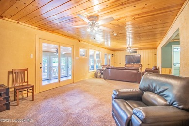Peaceful lake living meets timeless character in this inviting - photo 7