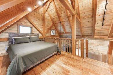 Set on approximately 213 acres of scenic lakes and mature timber - photo 9