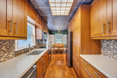 This beautifully renovated Cape in Oceanside offers 3 bedrooms - photo 14