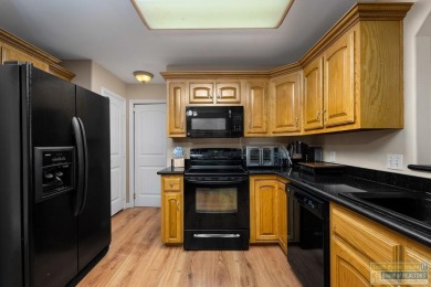 Immaculate handicap-accessible home in a quiet and gated 55+