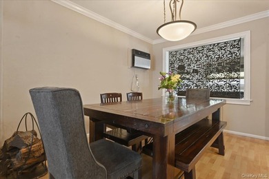 A charming expanded 3-bedroom, 2.5-bath split-level home located - photo 9