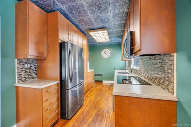This beautifully renovated Cape in Oceanside offers 3 bedrooms - photo 20