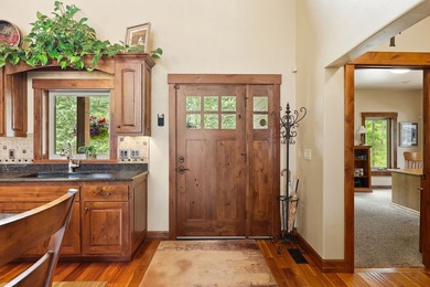 Set among nearly 10 acres of manicured forest, this private - photo 22