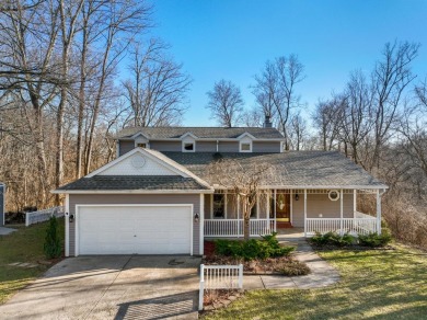 This well built 1.5 story transitional sits nestled in trees - Lake Home For Sale in Lawrenceburg, Indiana