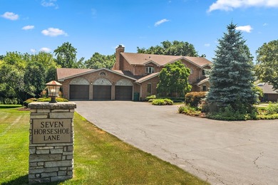 Nestled on a picturesque 1 acre lot in Equestrian Estates, one - photo 2