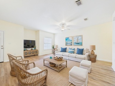 This beautifully maintained 3-bedroom, 2.5-bathroom end-unit - photo 2
