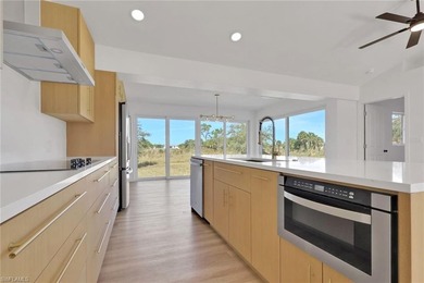 Experience refined midcentury modern living in this completely - photo 3