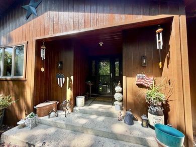 Enjoy the perfect blend of privacy, nature and lake living, with - photo 3