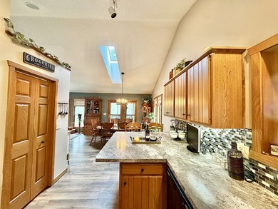 Enjoy the perfect blend of privacy, nature and lake living, with - photo 4