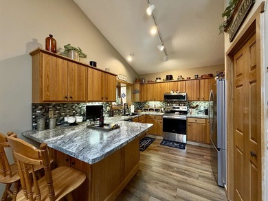 Enjoy the perfect blend of privacy, nature and lake living, with - photo 7