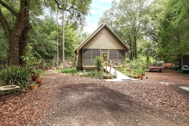 Florida cottage on .79 acres - totally renovated and nestled in - photo 1