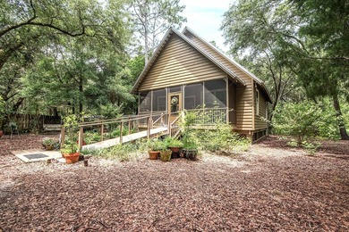 Florida cottage on .79 acres - totally renovated and nestled in - photo 4