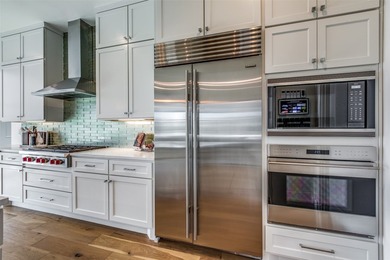 Luxury living awaits in this single-story penthouse at the - photo 11