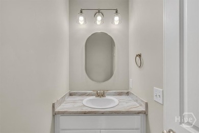 Newly constructed in 2024, this modern 3BR/2.5BA home offers an - photo 12