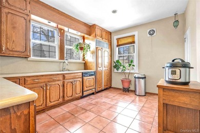 Located in a prime North Flushing neighborhood, this stately - photo 12
