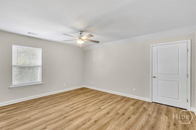 Newly constructed in 2024, this modern 3BR/2.5BA home offers an - photo 16