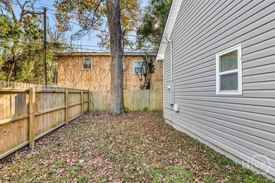 Newly constructed in 2024, this modern 3BR/2.5BA home offers an - photo 18