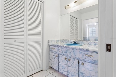 Virtually Staged. Welcome to this serene lakefront home on - photo 19