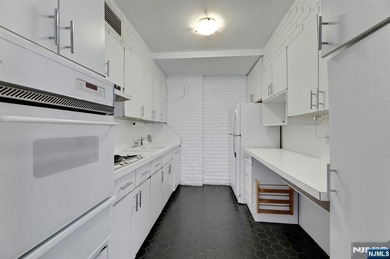 Discover unparalleled living in this magical two bedroom, two