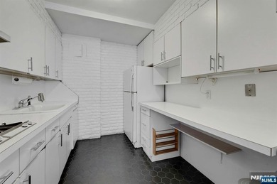 Discover unparalleled living in this magical two bedroom, two