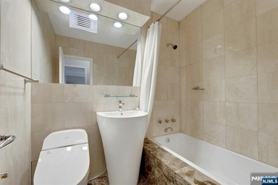 Discover unparalleled living in this magical two bedroom, two