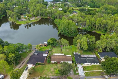 Virtually Staged. Welcome to this serene lakefront home on - photo 29