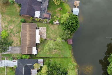 Virtually Staged. Welcome to this serene lakefront home on - photo 32