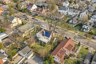 Located in a prime North Flushing neighborhood, this stately - photo 44