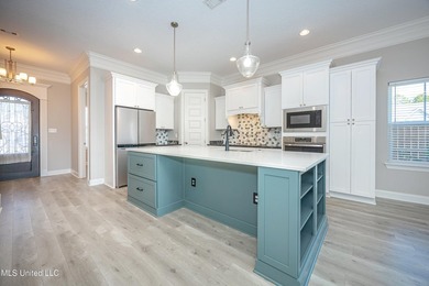 Welcome to 104 Westwind Court in the heart of Ocean Springs! - photo 11