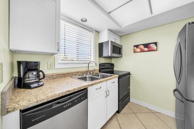 This lovely condo is your ticket to the fabulous beach lifestyle - photo 8