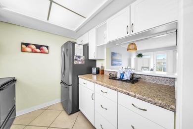 This lovely condo is your ticket to the fabulous beach lifestyle - photo 9