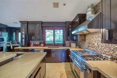 Welcome to this stunning custom-built Mediterranean home, where - photo 11