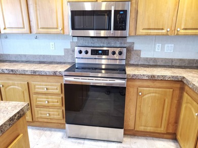 THIS HOME IS ON LEASED LAND WITH A MONTHLY LOT RENT OF $542 AND - photo 12