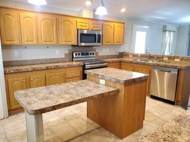 THIS HOME IS ON LEASED LAND WITH A MONTHLY LOT RENT OF $542 AND - photo 17