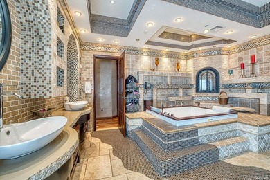 Welcome to this stunning custom-built Mediterranean home, where - photo 19