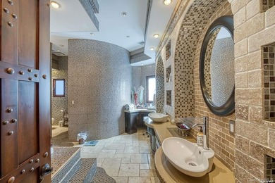 Welcome to this stunning custom-built Mediterranean home, where - photo 20